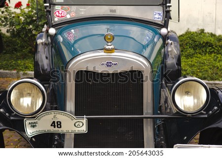 LANDSBERG, GERMANY - JULY 12, 2014: Public oldtimer rally in Bavarian city Landsberg for at least 80 years old veteran cars with a front view of Chevrolet K, built at year 1925