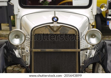 LANDSBERG, GERMANY - JULY 12, 2014: Public oldtimer rally in Bavarian city Landsberg for at least 80 years old veteran cars with a front view of BMW Dixi, built at year 1929