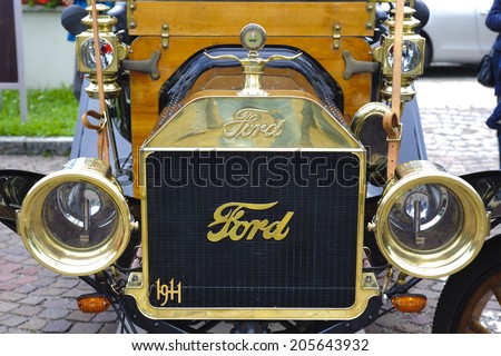 LANDSBERG, GERMANY - JULY 12, 2014: Public oldtimer rally in Bavarian city Landsberg for at least 80 years old veteran cars with a front view of Ford T Torpedo, built at year 1911