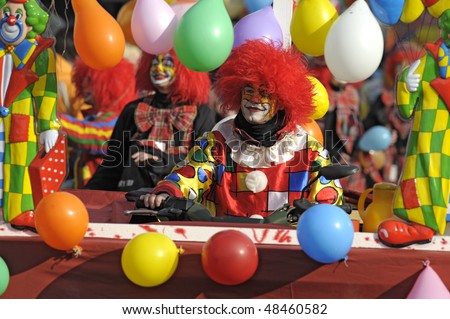 BAD HINDELANG, GERMANY - FEBRUARY 14: Clown with red hairs and colored face while carnival, February 14, 2010 in Bad Hindelang, Germany, Bavaria