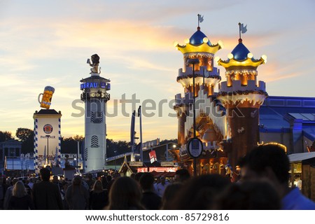 MUNICH, GERMANY - SEPTEMBER 21: panorama view at evening to the tents of bavarian beer breweries  of world biggest beer festival 