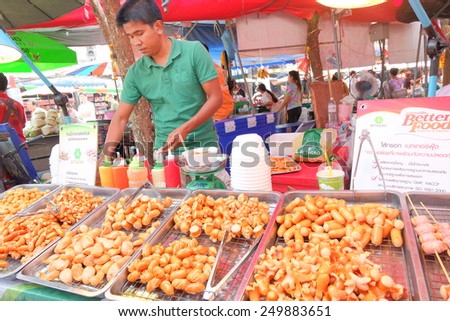 BANGKOK, THAILAND - :1 Febuary merchant sell a sausage in shopping market on Febuary 1 , 2015 in Bangkok, Thailand. Chatuchak (or Jatujak) weekend market is the largest market in Thailand.