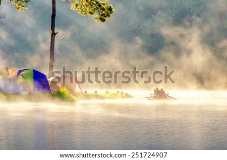 morning in pang oung with the light and shadow and steam over the lake in meahongson,Thailand