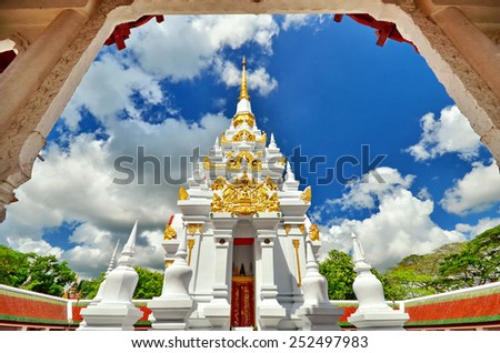 A white pagoda in frame at chiya temple , Suratthani , Thailand