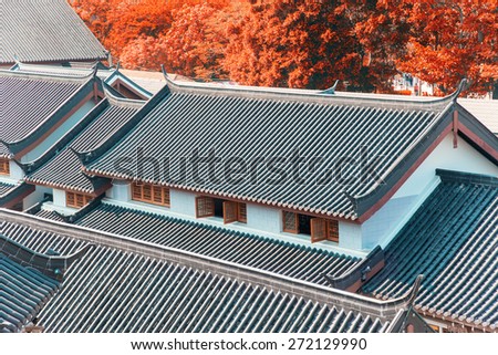 The traditional window, roof and concrete wall of antique Chinese building in China