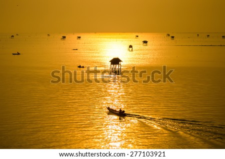 fisherman go to work and the sunrise in the morning at Bang Ta Boon bay