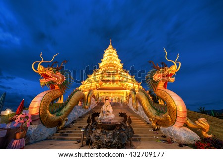 Golden Pagoda nine tier with dragon texture at Chinese temple - wat hyua pla kang temple , Chiang Rai,northern of Thailand , most beautiful popular temple in Thailand