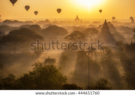 beautiful silhouette landscape view of sunrise morning and hot air balloon over ancient pagoda in Bagan , Myanmar \
Bagan is old Kingdom in Past of Burma