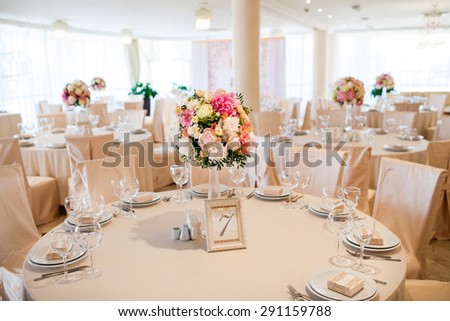 Beautiful flowers on table in wedding day. Wedding table set.