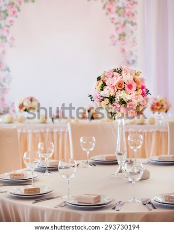Beautiful flowers on table in wedding day. Wedding table set.