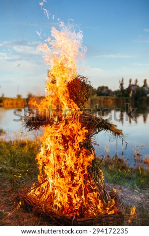 Burning an effigy of straw in the day, \