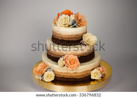 Naked cake. Wedding rustic cake with flowers.
