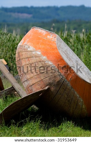 Old wooden boat on land
