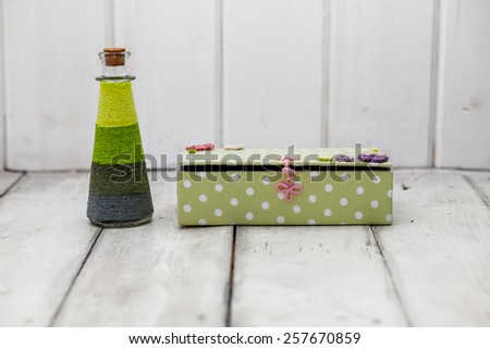 decorative green bottle and box, green decor, spring decor, bottle on a white background, box on a white background, a bottle and a box on a white background