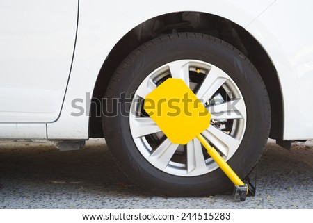 Clamped vehicle, wheel locked