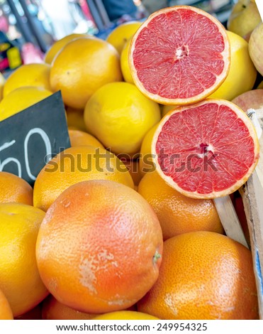 Close up of red grapefruit on market stand