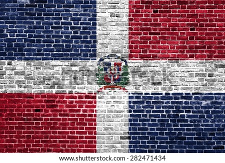 Flag of Dominican Republic painted on brick wall, background texture