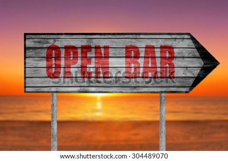 Red Open Bar wooden sign with on a beach background
