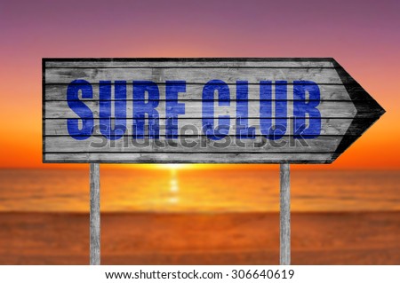 Surf Club wooden sign with on a beach background