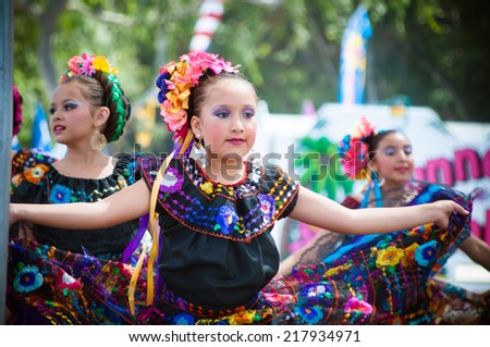 COSTA MESA, CA - JULY 24: Unidentified Mexican dancers perform in traditional costumes on stage at the Orange County State Fair in Costa Mesa, CA on July 24th 2010.