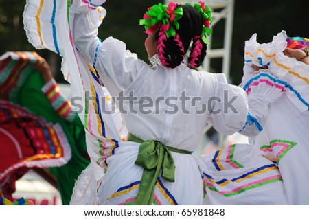 COSTA MESA, CA  -  JULY 24: Unidentified Mexican dancers perform in traditional costumes on stage at the Orange County State Fair in Costa Mesa, CA on July 24th 2010.