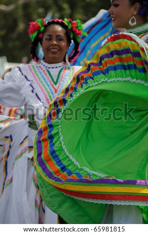 COSTA MESA, CA  -  JULY 24: Unidentified Mexican dancers perform in traditional costumes on stage at the Orange County State Fair in Costa Mesa, CA on July 24th 2010.