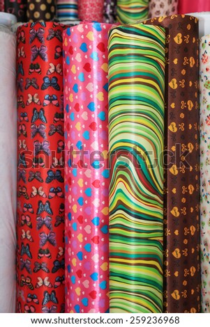Colorful printing fabric rolls, Focus on front part of rolls