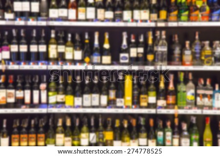 Wine Liquor bottle on shelf - Blurred background