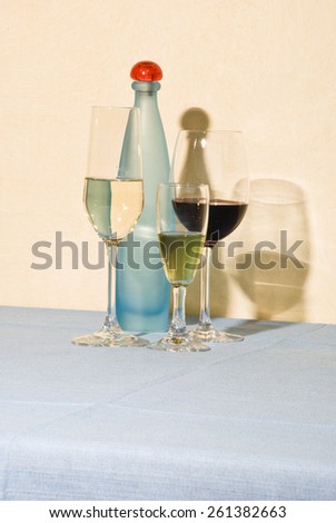 Composition with wine glasses and bottle in vertical format