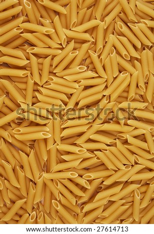 Penne rigate pasta background. Abstract food textures.