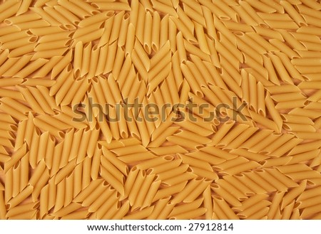 Penne rigate pasta background. Abstract food textures