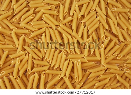 Penne rigate pasta background. Abstract food textures