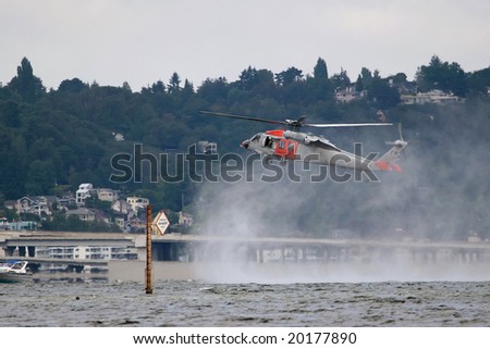 Seattle WA-August 3: Navy rescue team performing it\'s rescue demonstration at Seafair on Lake Washington August 3, 2007.
