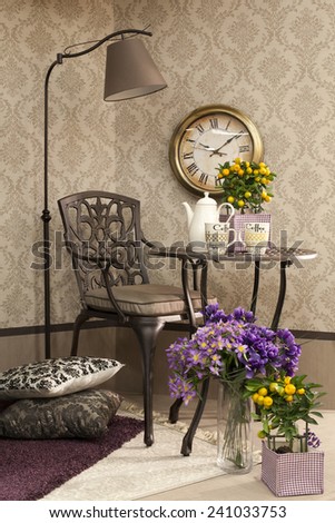 Metal furniture arranged with flowerpots