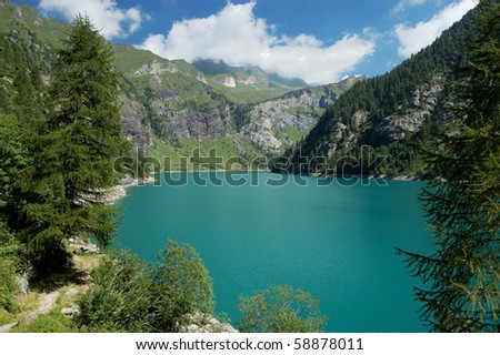 panoramic view of alpine lake, Agaro artificial lake, Italy