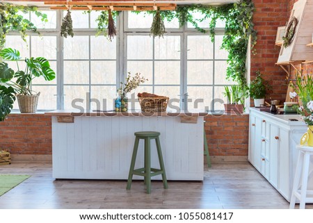 kitchen in loft style, decorated for Easter, brick wall, interior details