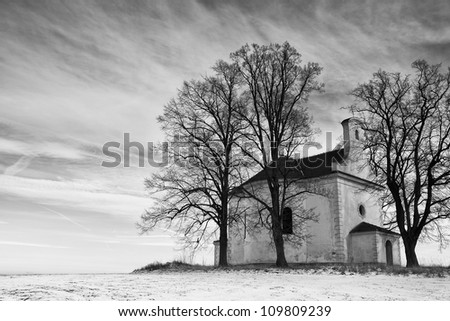 The ruins small church on the hill in winter