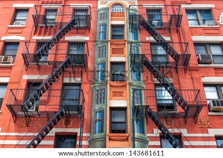 The typical old houses with fire stairs in New York in USA