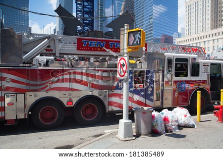 NEW YORK-JULY 29,2013: Typical american fire truck in Manhattan next the Ground Zero, New York City, USA,July 29,2013