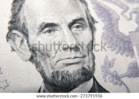 Lincoln face on five dollars banknote