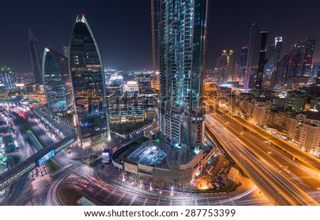 Dubai - June 5 : Dubai downtown streets and buildings near Dubai Mall and Burj Khalifa on June 5, 2015 in Dubai.