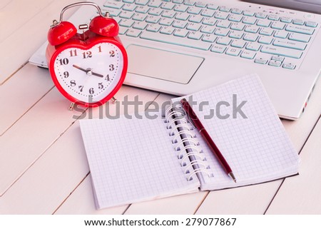 laptop and alarm clock