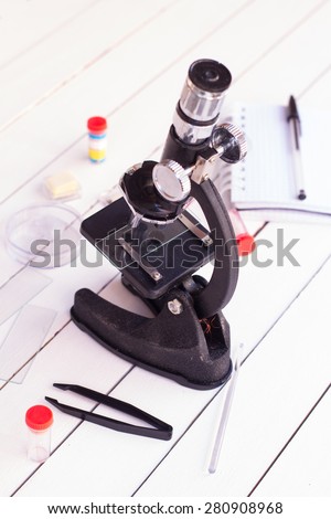 Microscope and notebook
