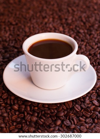 coffee mug and coffee beans
