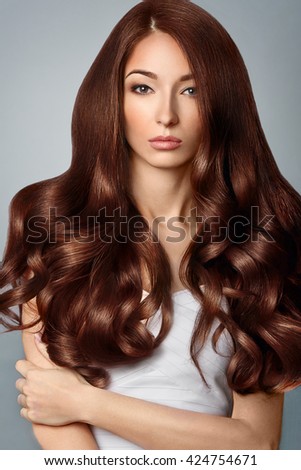 Healthy Brown Hair. Beautiful woman with Gorgeous Hair. Hairstyle.
