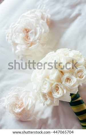 White rose and pink roses on the bed in morning wedding ceremony .