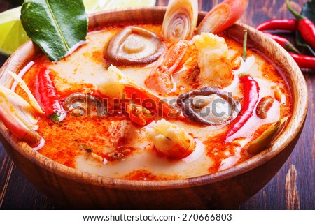 Thai Tom Yam soup with shrimp and mushrooms, served with lime and rice