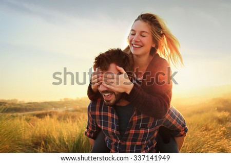 Happy couple playing