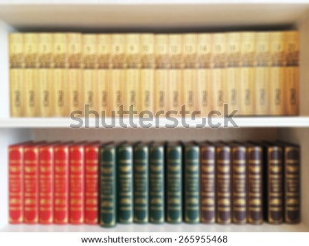 Blur Colorful Books on Wooden Book Shelf