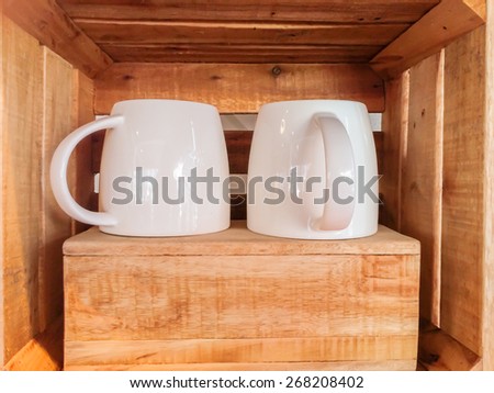 Two White Cups in Wooden Vintage Box with Space to Input Text Below